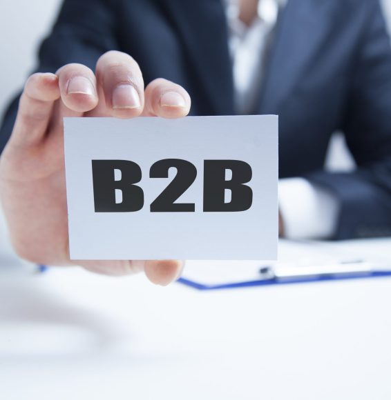 businessman hand card with the inscription b2b businessman hand card with the inscription b2b